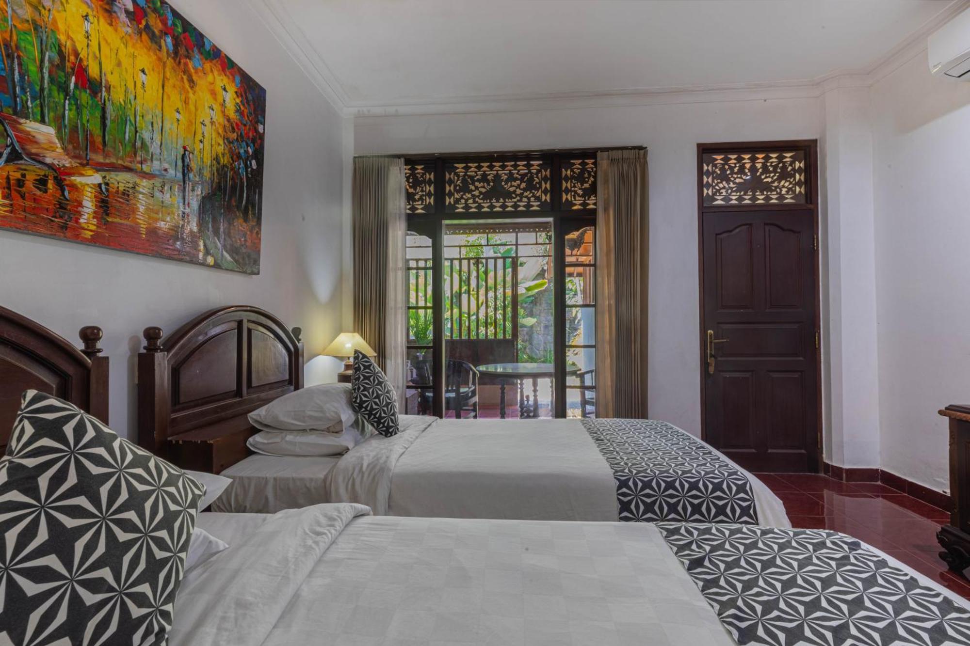 Puri Mango Guest House Sanur Exterior photo